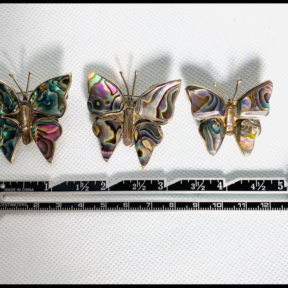 Three beautiful abalone inlaid butterfly pins